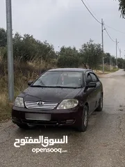  13 تويوتا كورولا 2004