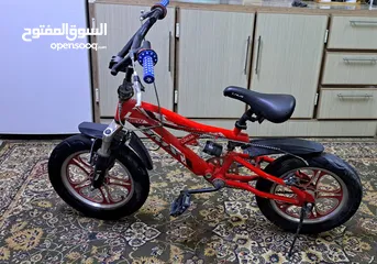  1 بايسكل bmx الب،البركات خربانه بس الي بل بايدر يشتغل كلش زين وبي مجال