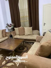  2 كنب زائد طاولات خشب زان كنب تسع مقاعد في حاله جيده