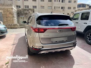  2 كيا سبورتاج  اصل برايفت ماطور 2000ديزل 4x4  فل اضفات بدون فتحة  عداد اصلي 77000km
