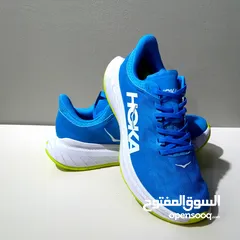  2 Shoes Saucony and Hoka for Running, Made in Vietnam.