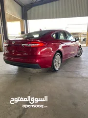  11 Ford fusion Hybrid clean title 2019 SE