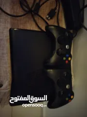  1 إكس بوكس 360 مستعمل نظيف +ثلاث ايدين +فيفا18+جي تي اي 5 + الكثير من الاعاب