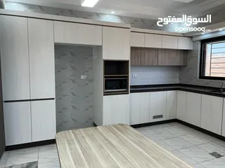  15 شقة استثمارية  للبيع بسعر مغري مع مطبخ وديكورات خشبية مميزة