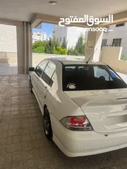  9 ميتسوبيشي 2012 لون ابيض