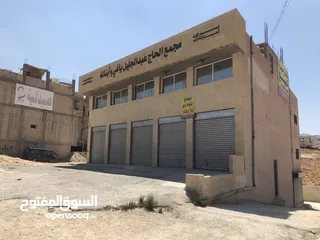  7 محلات تجارية عدد 3 مفتوحين على بعض - عين الباشا ش. تجاري حيوي الباب 195 شهري