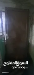  1 باب خشب مع برواز  باب حديد ثقيل مع برواز  باب المنيوم مع برواز  شباك المنيوم ابيض وزجاج اخضر مع بروا