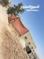  10 منزل مستقل للبيع في مدينة يطا   يصلح تحويله الى مركز طوارئ او كلية او غيرها