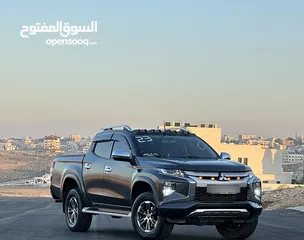  7 ميتسوبيشي L200 2023 لون فيراني مميزه فحص كامل كرت ابيض 7 جيد وارد الشركه