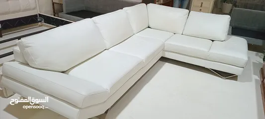  4 leather sectional sofa from natuzzi,   with excellent condition and free delivery all over United AE