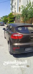  4 كيا ريو موديل 2016 للبيع لون بني خارجي وداخلي بيج
