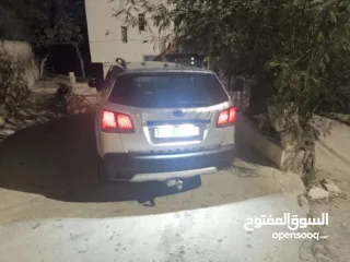  6 كيا سيرنتو4×4ديزل متور2200 فول اضافات فتحه بانوراما هوك مسجل بترخيص