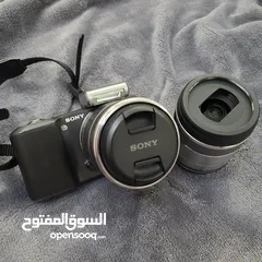  5 sony NEX-3 camera with 2 lenses