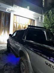  3 متسوبيشي ماقنومL200 2001