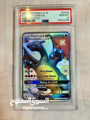  2 Pokémon Cards graded Charizard