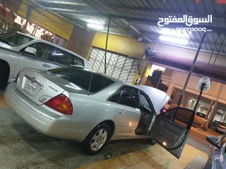  10 Toyota avalon 2002  price 1000 BD