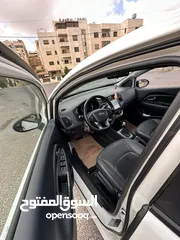  4 كيا برايد هاتش باك موديل 2014 فحص 4 جيد سعة الموتور 1600 سي سي الشكل رياضي لون ابيض سقف اسود