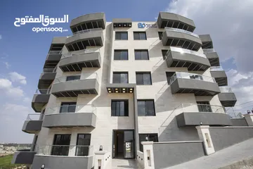  11 شقة مميزة طابق ثالث مع روف مساحة 160متر مع روف50 مترفي شمال عمان الجبيهة-حي المنصور مشروع BO517