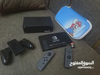  7 جهاز نينتدو سويتش حالة ممتازة جدا مع أغراضه ولعبة