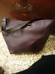  1 حقائب يد مستعملة استعمال خفيف