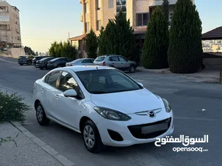  2 مازدا زوم 2 موديل 2012 فحص كامل 7 جيد ولا ملاحظة لون ابيض قاطعة مسافة 100 الف كيلو فقط (استخدام شخصي