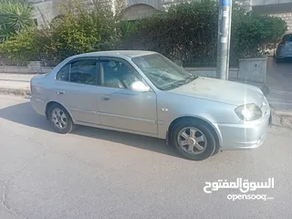  3 هونداي فيرنا لون سلفر موديل 2004 مرخصة  فحص 4 جيد للبيع بشكل مستعجل