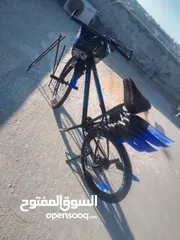  12 بيع بسكليت بحاله جيده جدااا اللون اسود وازرق واضح بالصوره غيارات شغاله وبرك شغال 100%
