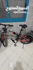  1 used like new foldable land rover bicycle with gears and disc breaks fits in any car boot,comfy seat