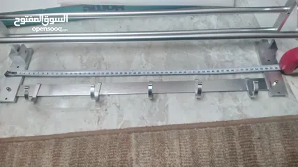  14 منشر ملابس و مناشف للحمامات