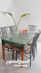  1 طاوله سفره زجاج مع سته كراسي