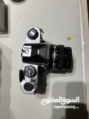  2 Vintage Nikon camera
