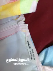  16 ملابس مستعملة لطفلة واحدة العمر من 8-10 سنوات  أغلبهم من شي ان . ورد تاج وهم بحالة ممتازة .