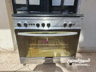  1 غاز تكنو ستانلس منفوض كامل 90سم فل سيفتي و كهربته شغالة (قدحة و شواي فرن و لمبة) مع مروحة تبريد فرن