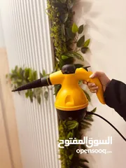  1 جهاز التنظيف بالبخار الاصفر