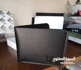  18 محل ملابس قطنيات اصلية واحذية طبية جلد اصلي