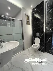  12 شقة ارضية مع ترسات خلف جامعة البتراء تشطيبب مميز ومنطقة هادئة