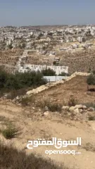  1 ارض في منطقة لوزة مطلة ومعمرة ع تلة الجبل