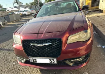  1 كرايسلر 300 لون ماروني رقم بغداد