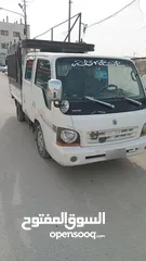  1 كيا بنجو 2003