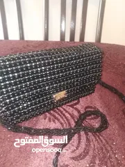  18 حقيبة يد نسائية مصنوعة من حب  اللولو الأسود من افخم  انواع اللولو صناعة ممتازة متينة حجمها متوسط