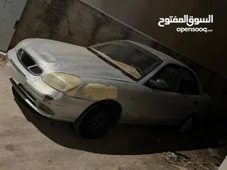  3 دايو نوبيرا  موديل  2000 ماتور 1600 يد أولى  لون فضي  ماتور وجير بحالة ممتازه