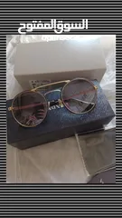  1 نظارة شمسية ماركة برادا prada