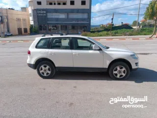  9 فولكس فاجن طوارق 2008 بحالة الوكالة  ماتور ديزل 3000 V6 عداد 145000 جير و ماتور و شصيات 100% وعلى ال