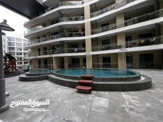  2 1 BR Flat in Muscat Hills with Shared Pool and Gym
