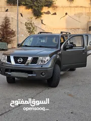  7 للببع بسبب السفر  نيسان باثفيندر مميزة فل اوبشن،  جلد ، دفع رباعي ، فتحة سقف. هوك خلفي، كاميرا خلفي