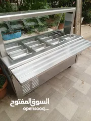  1 ثلاجة سلطات تبريد هواء بحالة جيدة وبلاطة جريل ايطالية بحالة جيدة