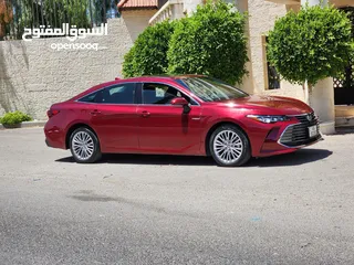  26 تويوتا افالون لون خمري حره جديد باسم المستورد 2021 فحص 3 جيد أعلى صنف بالاضافات بطاريه ليثيوم بسعر