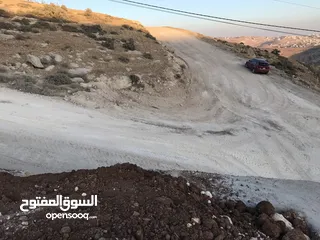  7 قطعة ارض في أم رمانة قرب شارع الأردن للبيع