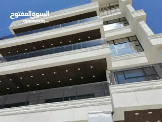  16 شقة طابقية للبيع  الدوار السابع حي الروابي 325م