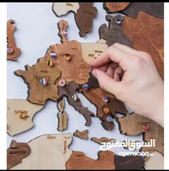  4 خريطة العالم بعده أحجام خشبي او اكرليك و ساعات نسر معدن بعده نماذج